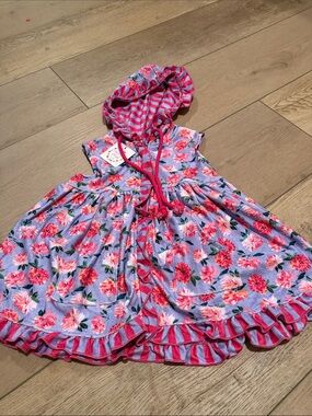 Cheeky Plum coverup. NWT. Size 2/3T.